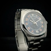 rolex modern 2007 oyster perpetual blue dial with orange color arabic numerals ref 114200 cal 3130 2