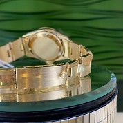 rolex vintage 1972 oyster perpetual 25mm lady  6719 18ct gold lady tapisserie dial 6