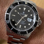 rolex vintage 1996 submariner date 16610 steel t serial with orig punched paper 1