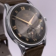 tissot vintage 1942 calatrava roman numerals bicolor dial caliber 27  ref 1189999 2