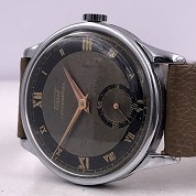 tissot vintage 1942 calatrava roman numerals bicolor dial caliber 27  ref 1189999 3